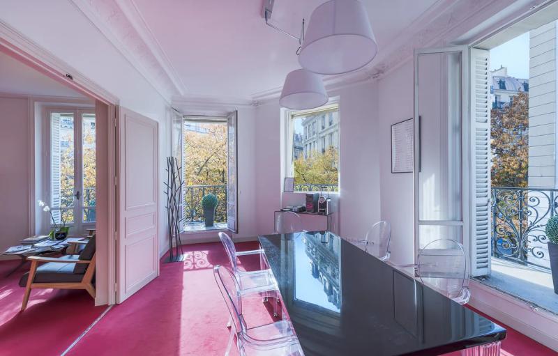 Haussmann-style office at Office notarial 1661, black table and balcony