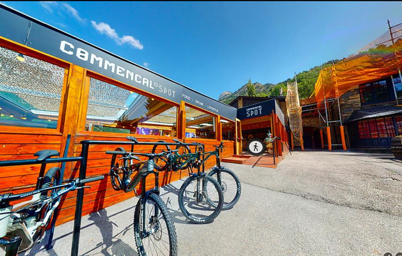 Wooden terrace of the Commencal Spot, bikes parked in front