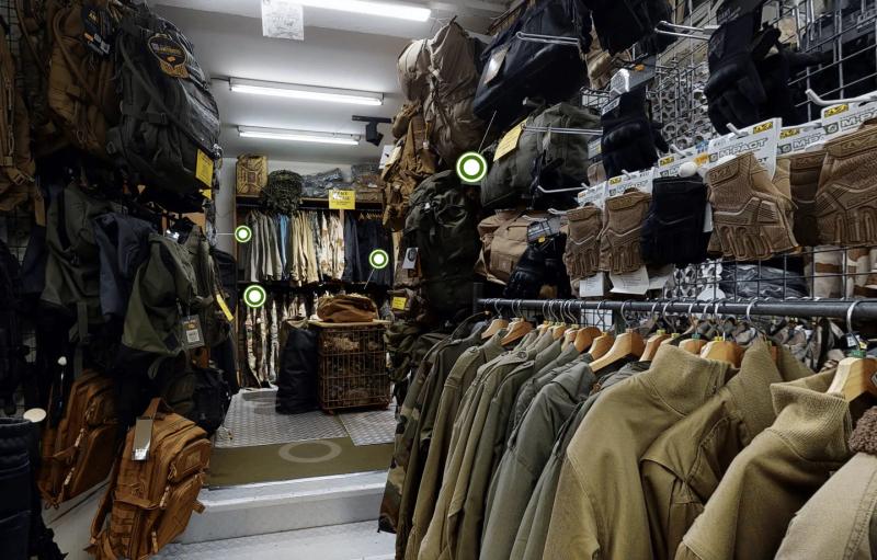 Aisles at Surplus Hector, khaki jackets and bags