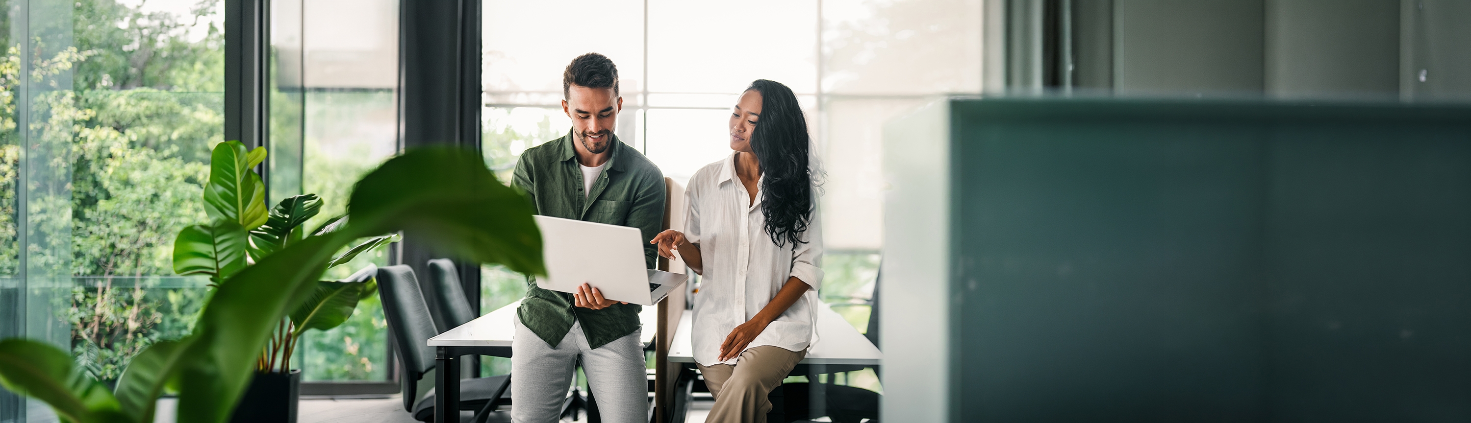 Professionals collaborating in a modern workplace