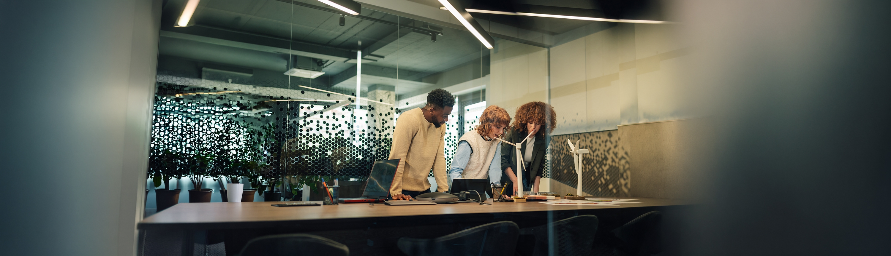 Professionals collaborating in a modern workplace
