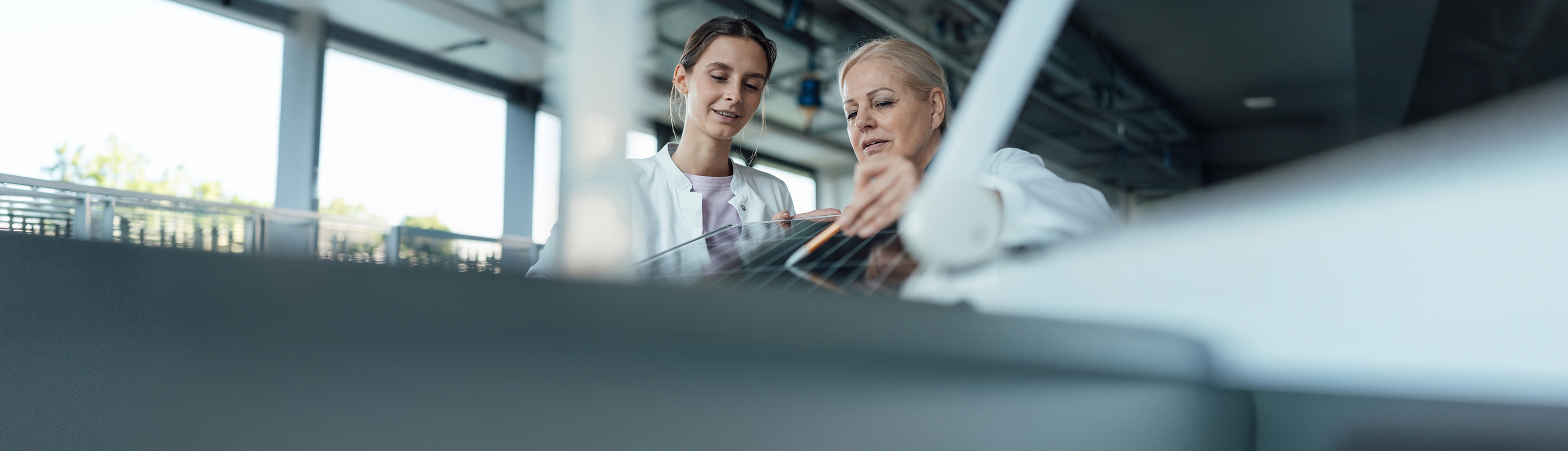 Professionals collaborating in a modern workplace