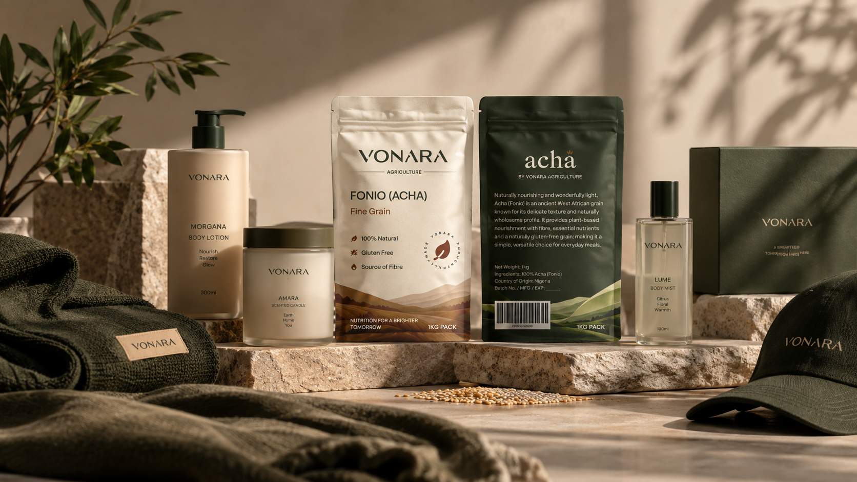Vonara products arranged in warm sunlight, including Acha fonio pouches, body care, a candle, fragrance, clothing and packaging.