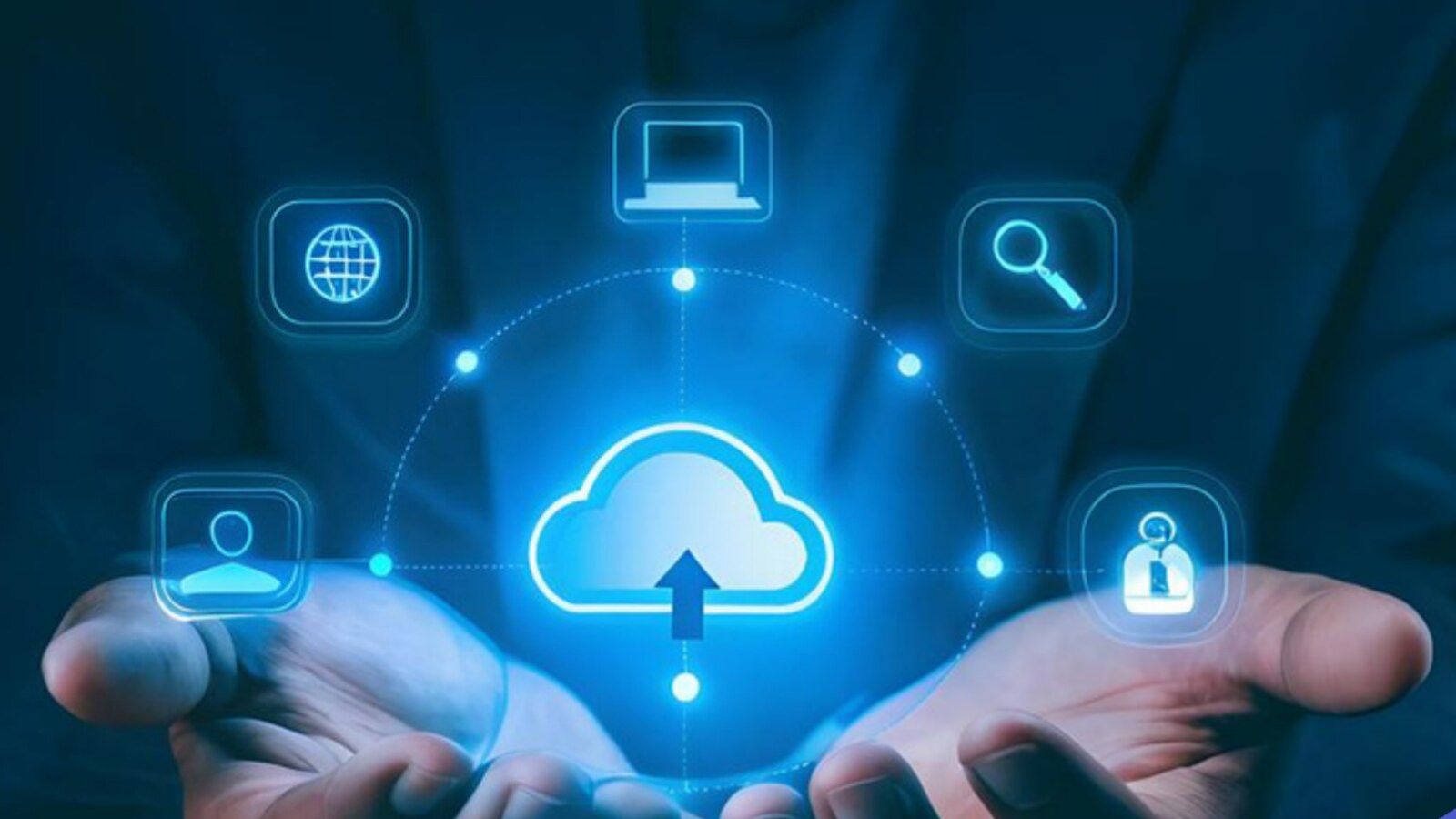 Hands holding a glowing cloud connected to app icons