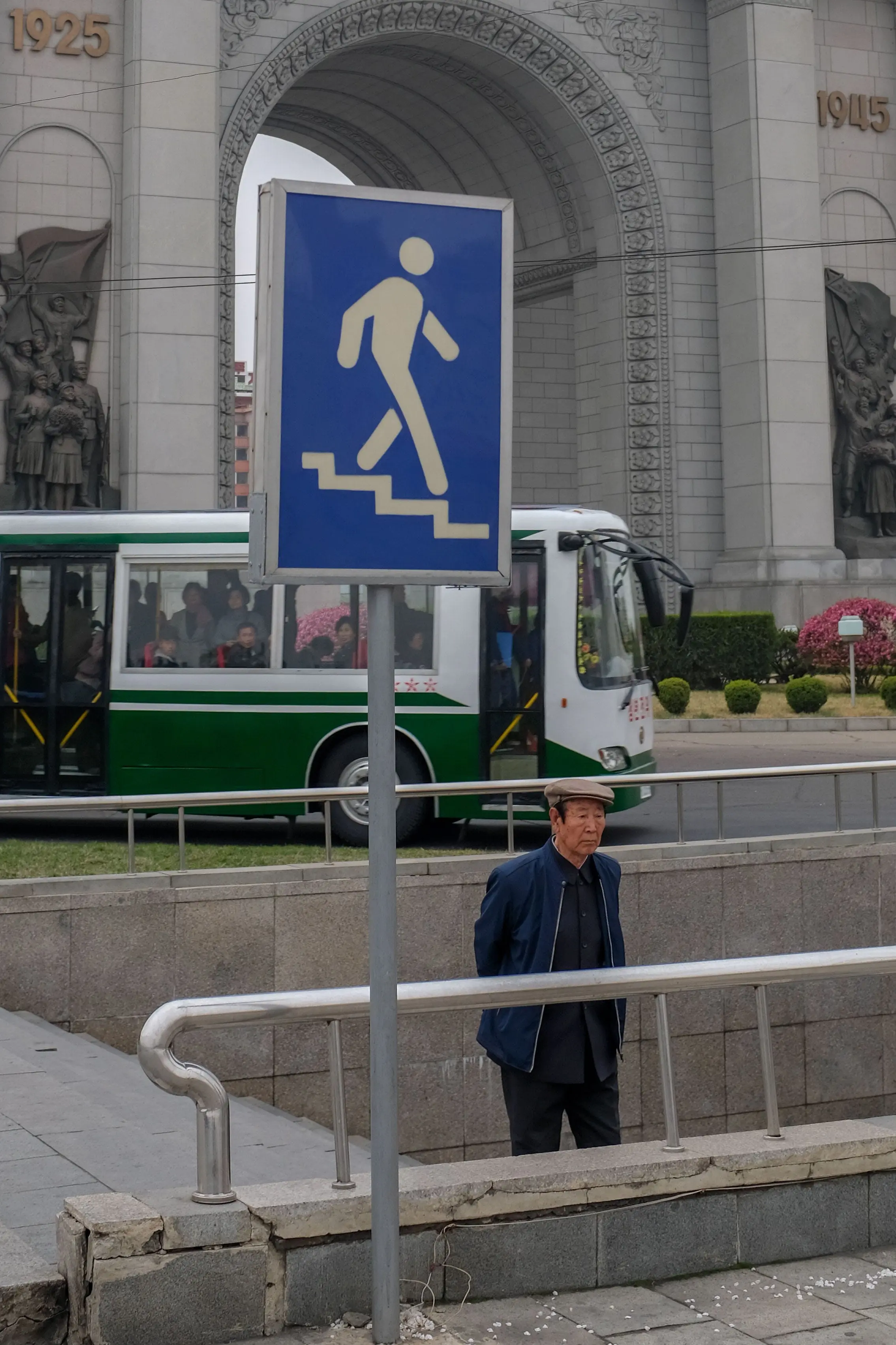 Old Korean dude keeping an eye out on the foreigners