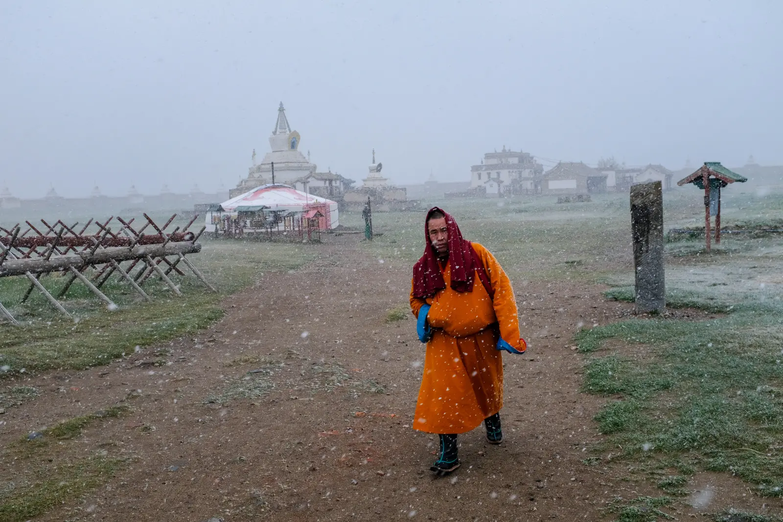Bhuddist monk in the snowy Erdene Zuu Monastery, Mongolia