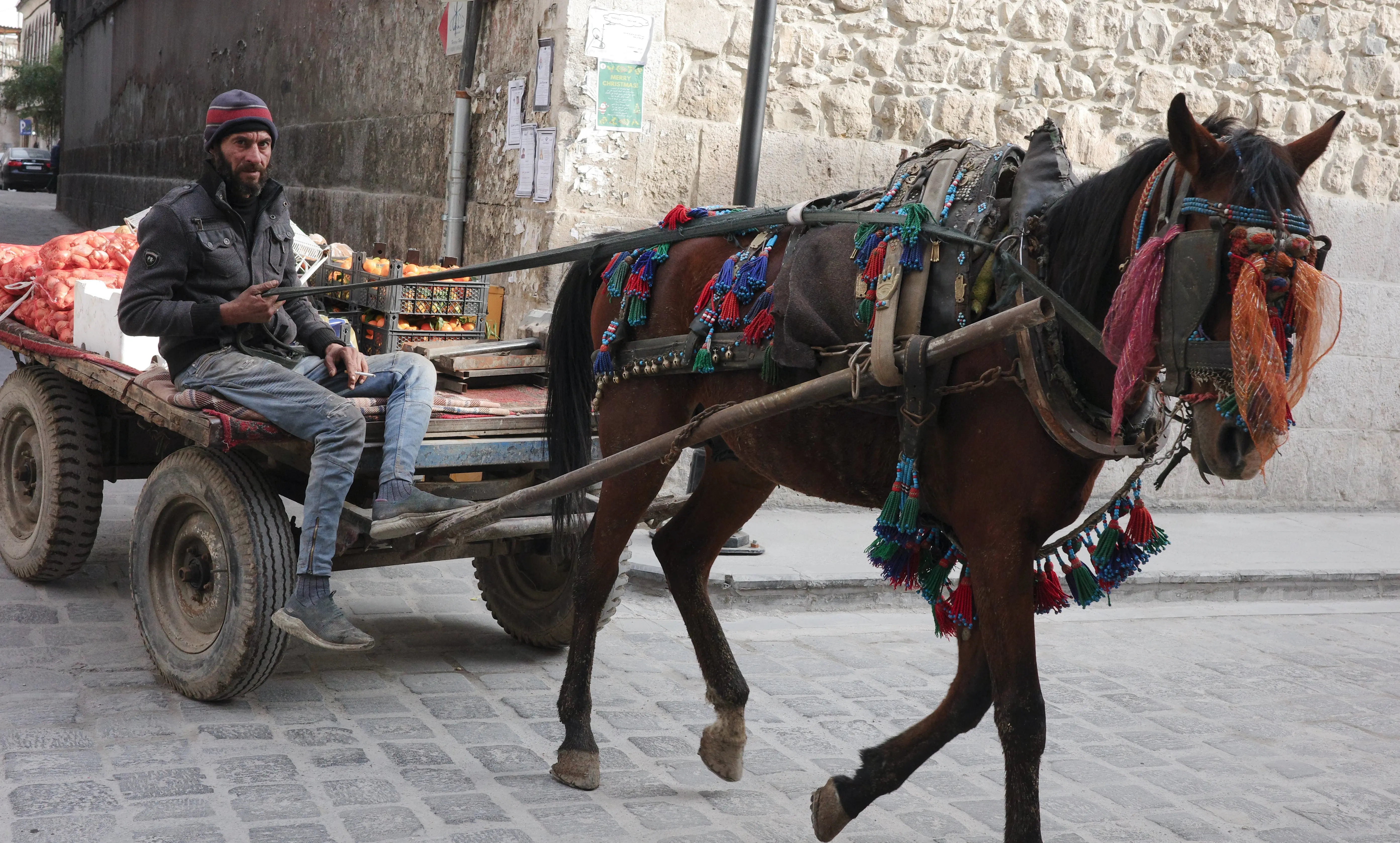 Onion seller delivering via horse and cart