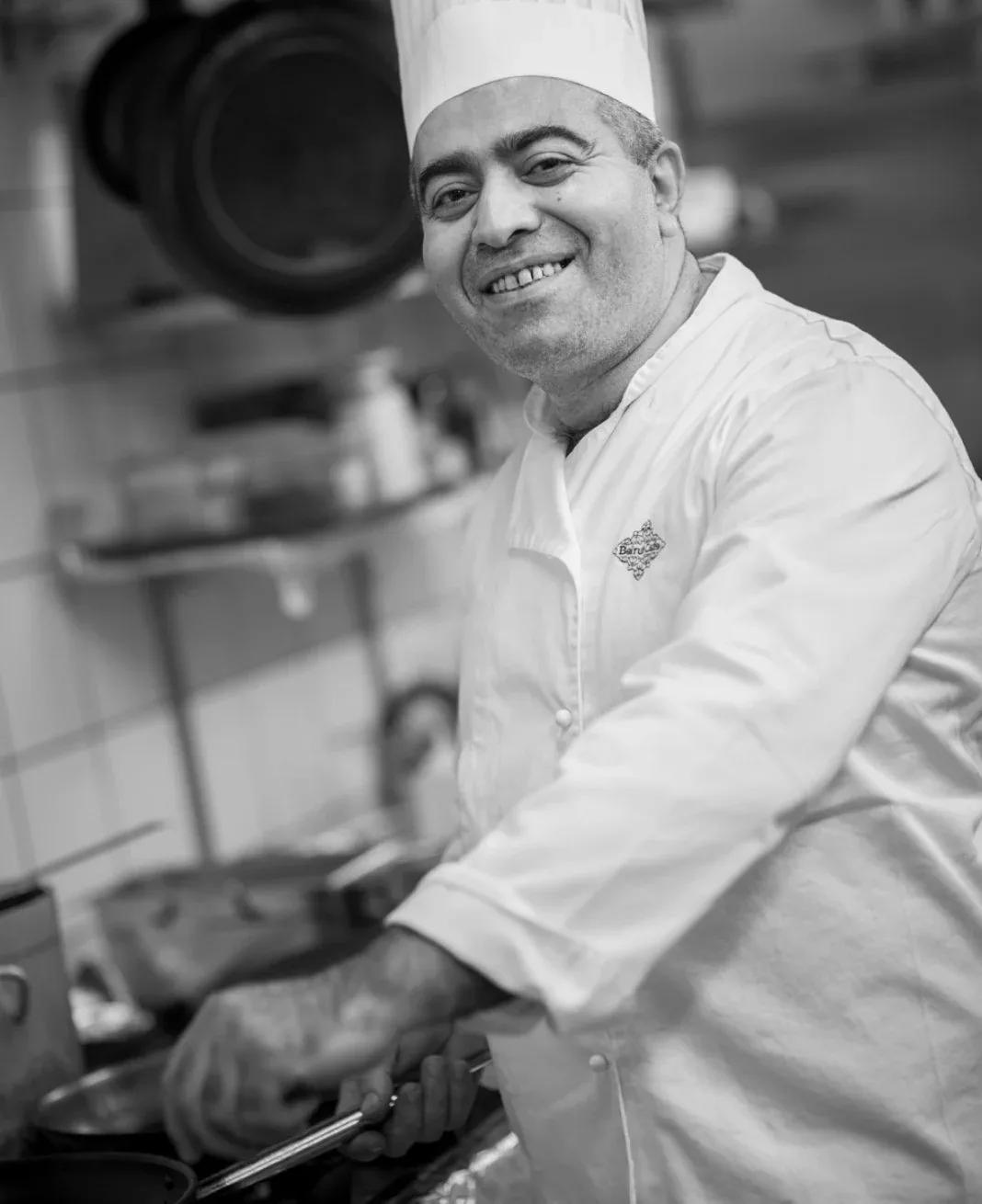 Abo Rashid in the kitchen at Beirut Café
