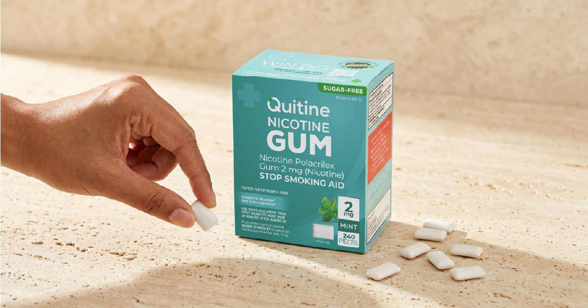 Person chewing Quitine 2mg nicotine gum