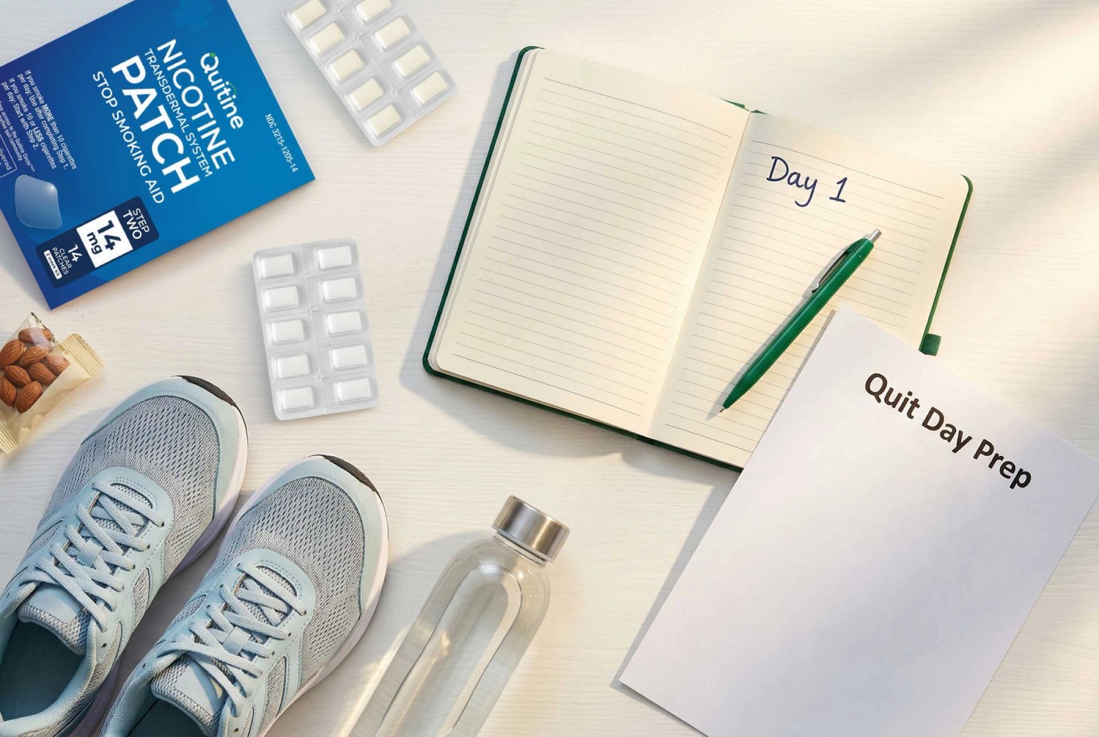 Quit day prep laid out with workbook, patch and running shoes