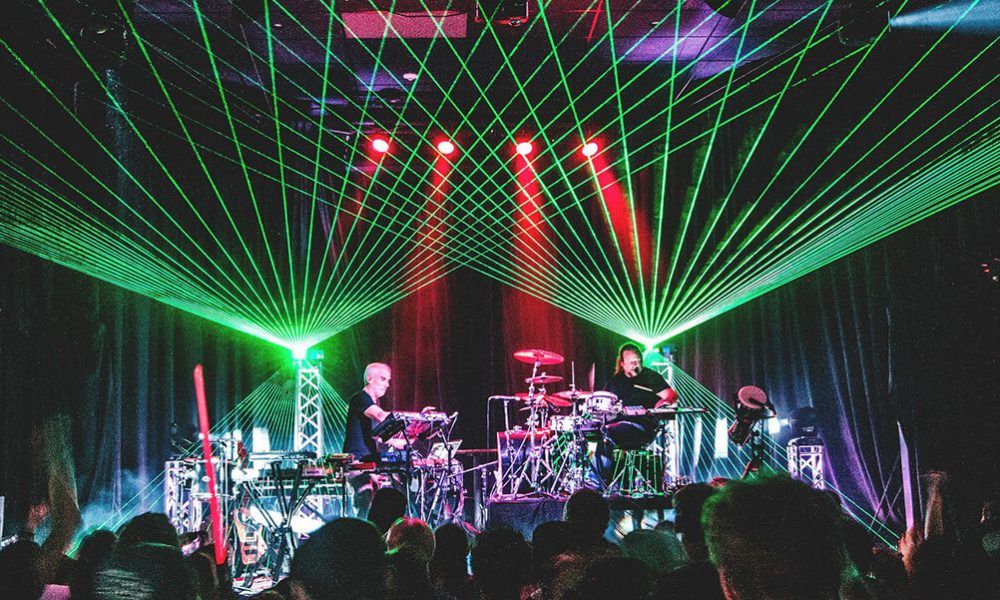 Liquid venue in Madison with EOTO band on stage and green lazers behind them