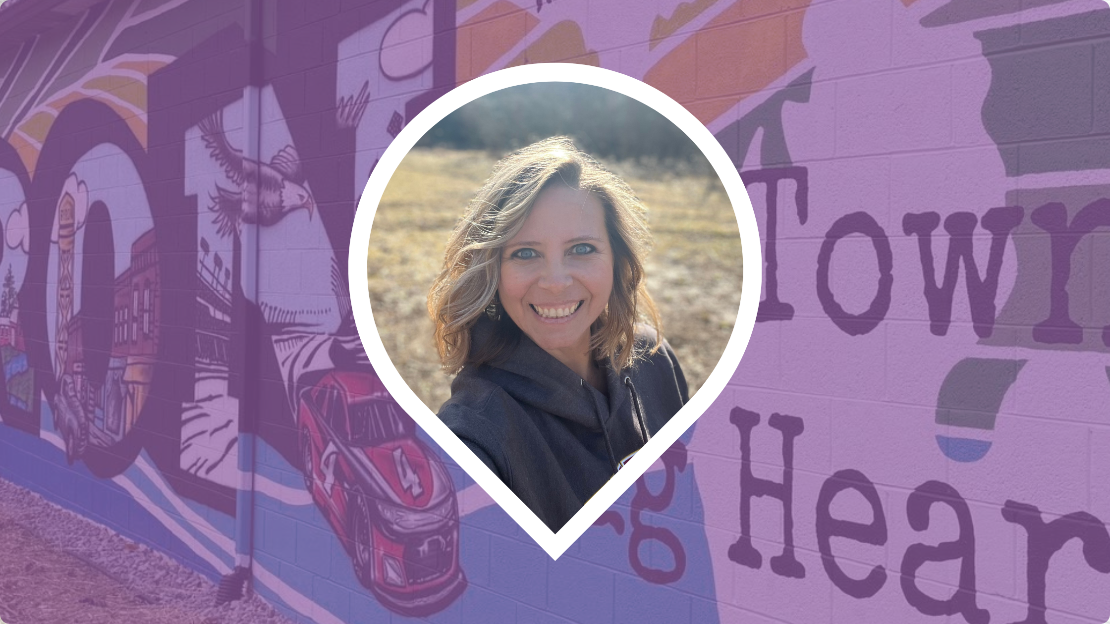 Headshot of Debra Baker-Murph set in front of the Byron Mural