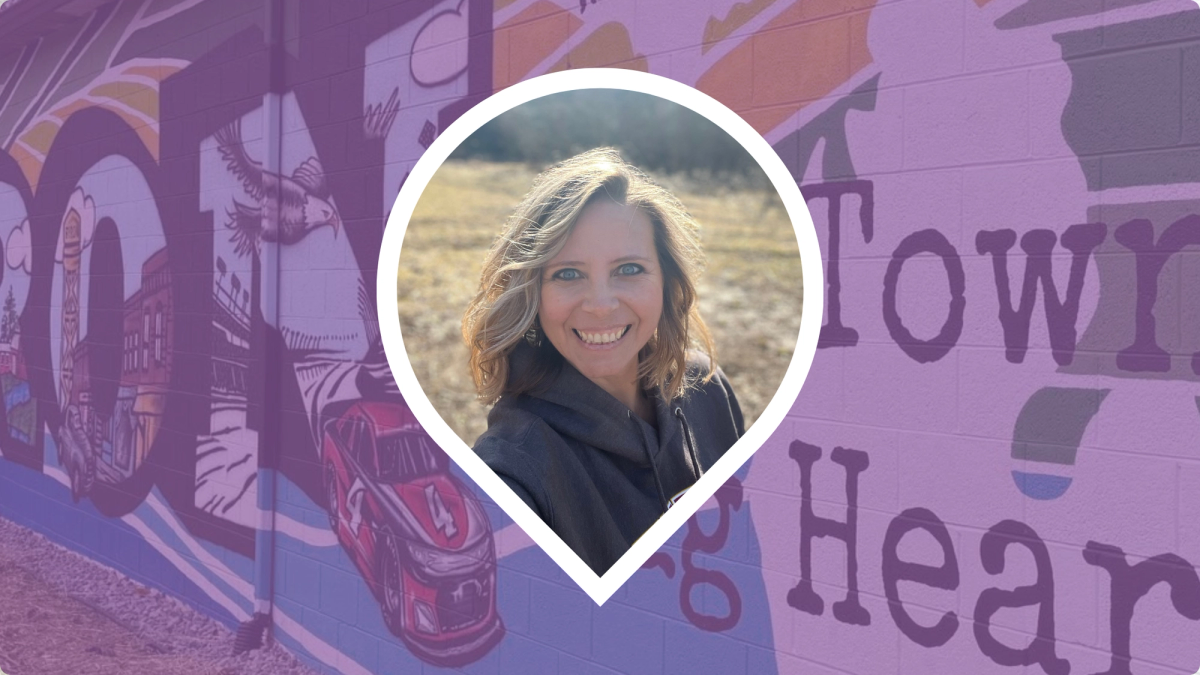 Headshot of Debra Baker-Murph set in front of the Byron Mural