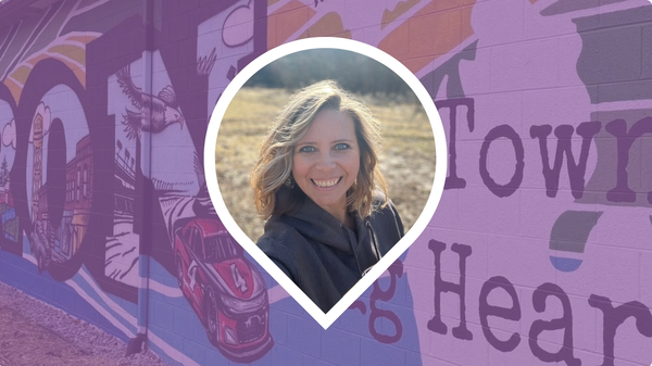 Headshot of Debra Baker-Murph set in front of the Byron Mural