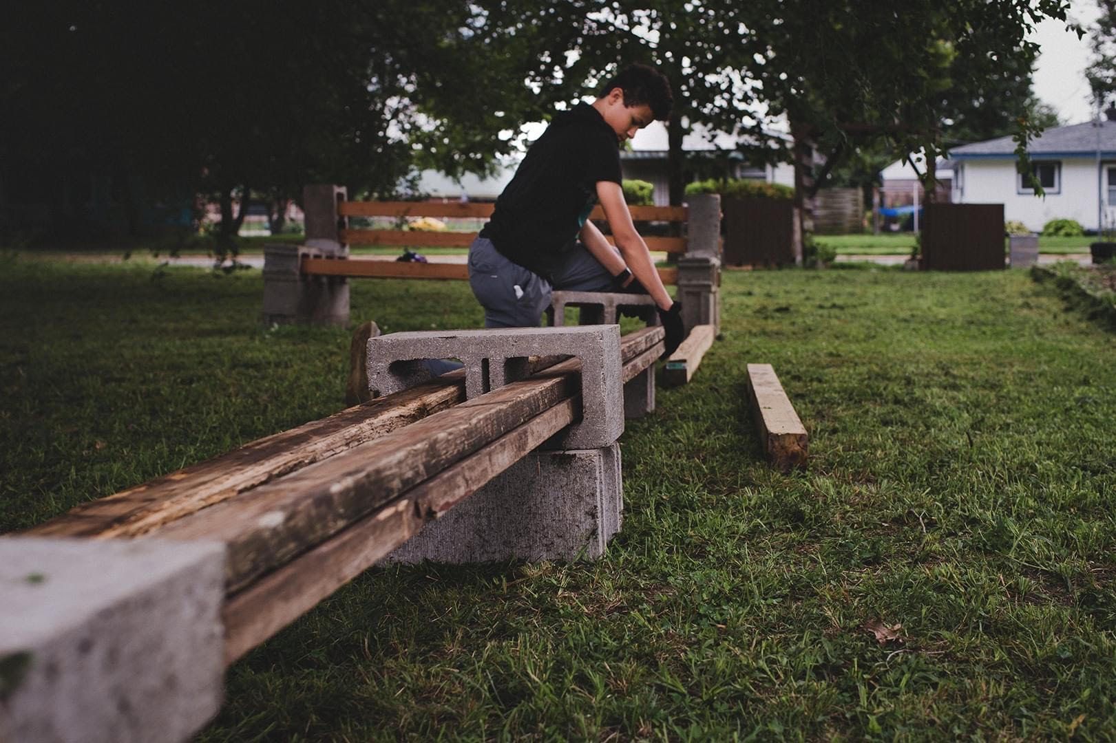 A volunteer working on the Community Rocks Vegetable Garden