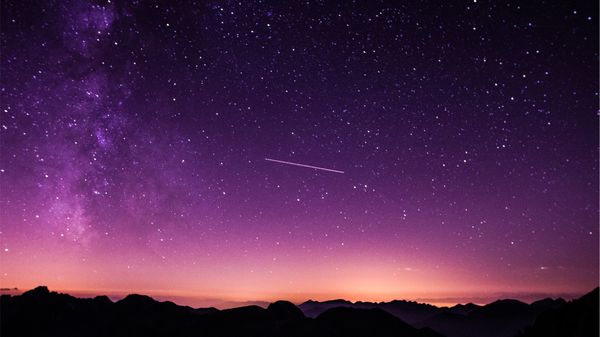 Night sky with shooting star