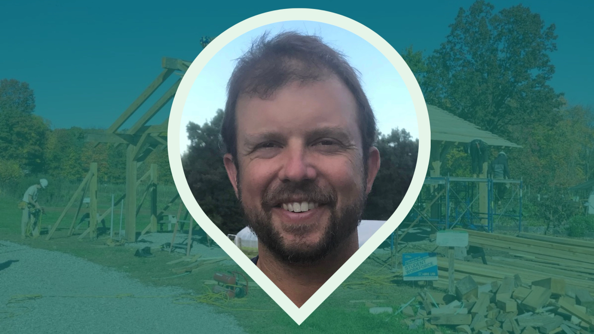 Steve Munno, Executive Farm Director of Massaro Community Farm, a white man with short dark hair and a big smile.