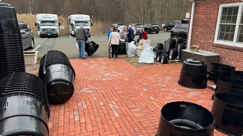 Sustainable Suffield distributing compost bins to residents.