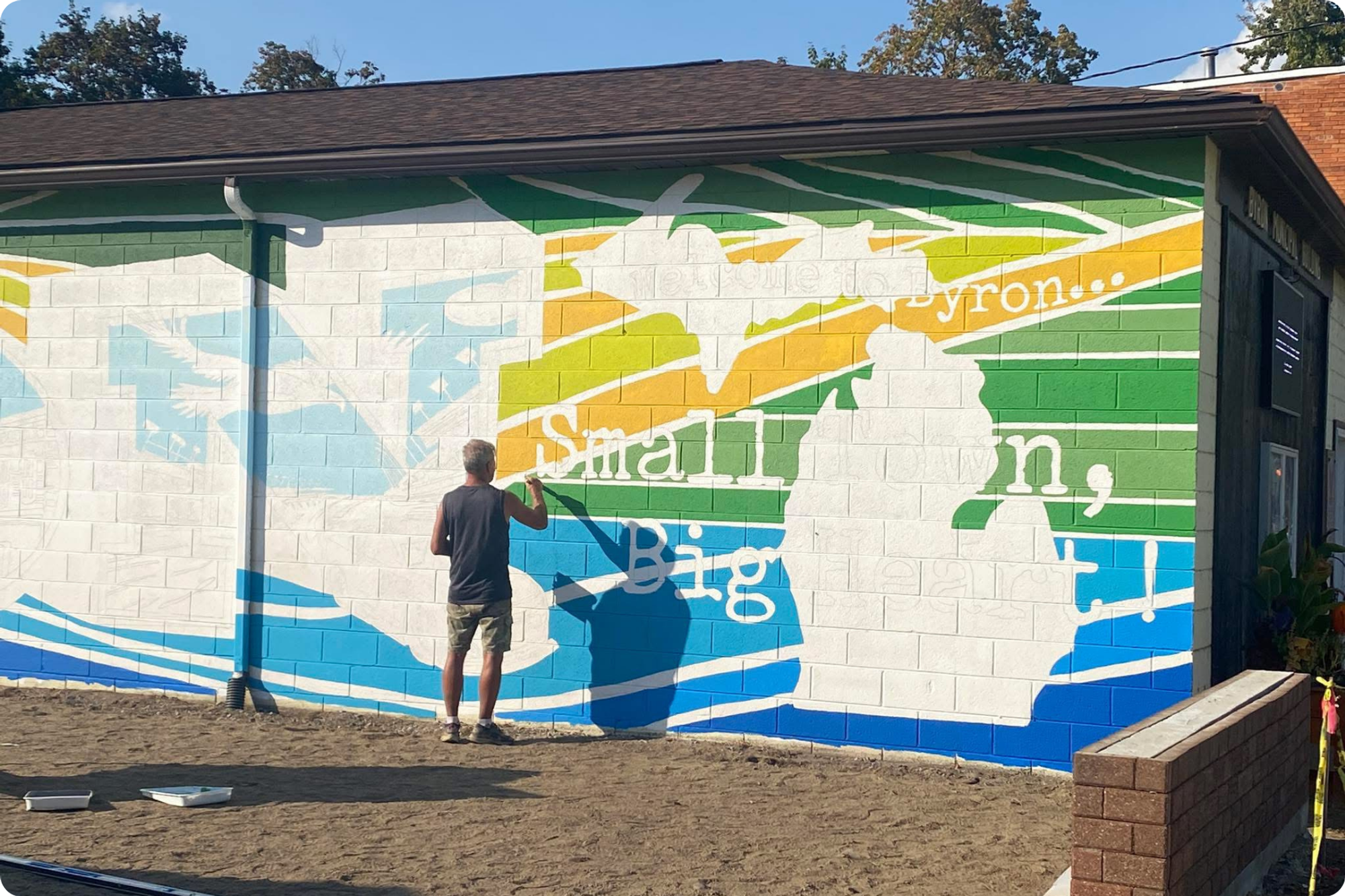 Kevin Hooley from 210 Creative works on the vibrant new mural