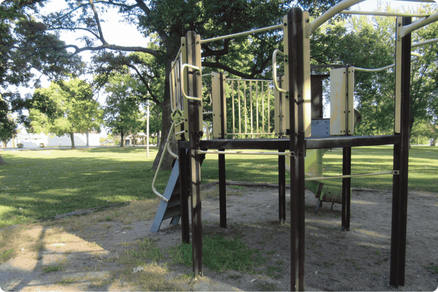 A GIF showing the before-and-after transformation from the old, inaccessible, and outdated playground to the safe, sunny, and healthy Paradise Playground structure.
