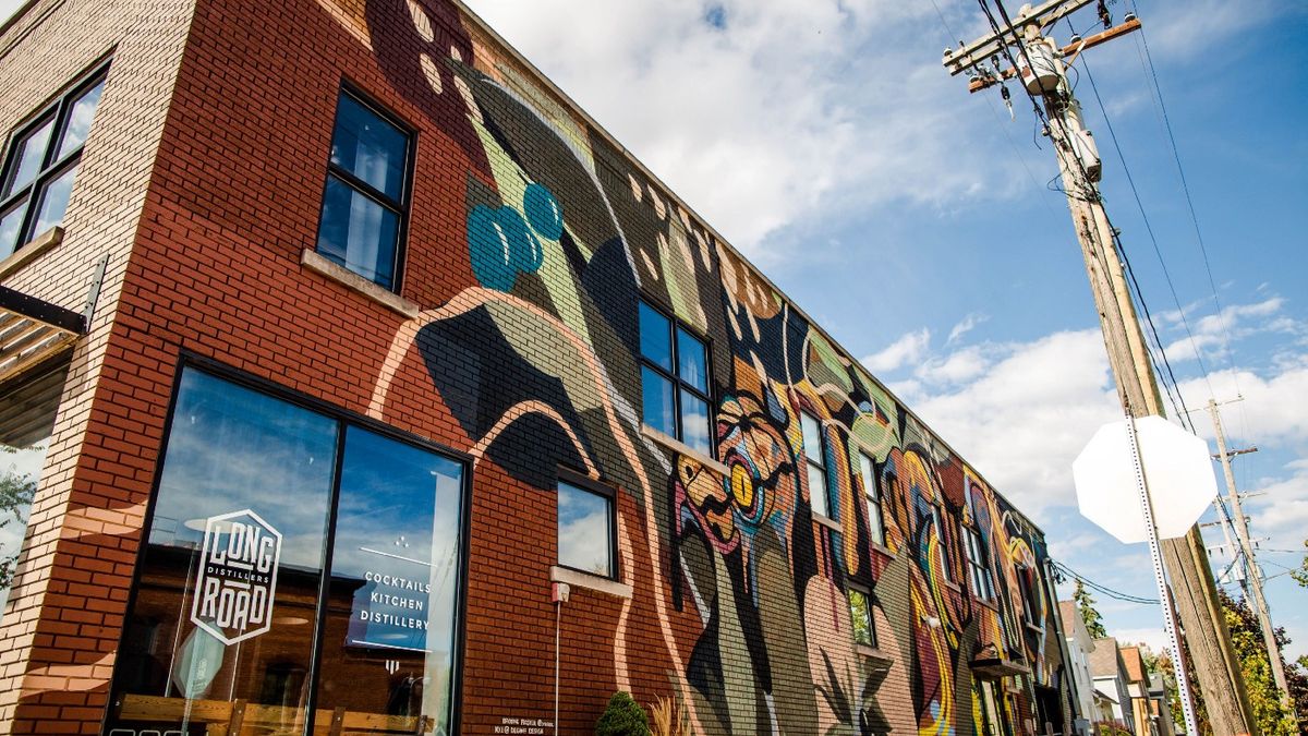 The Long Road Distillers Mural by artists Brooke Rosier and Kyle Degroff for the After Dark project in Grand Rapids, Michigan.