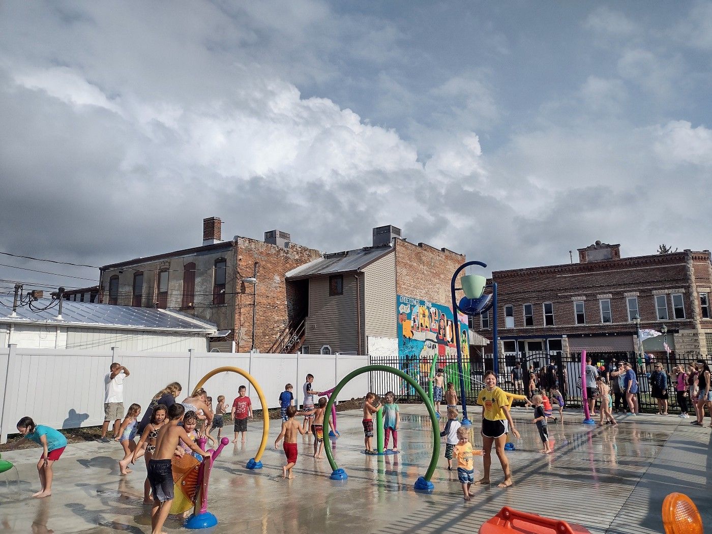 Kids play in the Arcadia Splash Pad in downtown Arcadia, Indiana