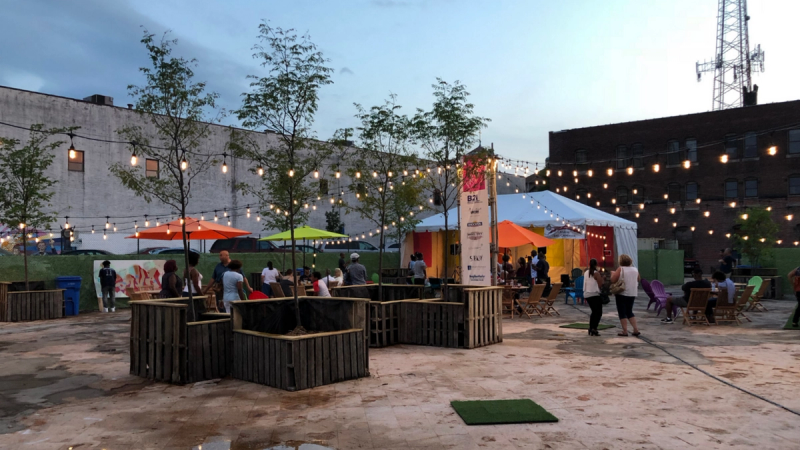 PROVA! Brockton in year one, 2018, featuring outdoor lighting, a stage, and pop-up seating.