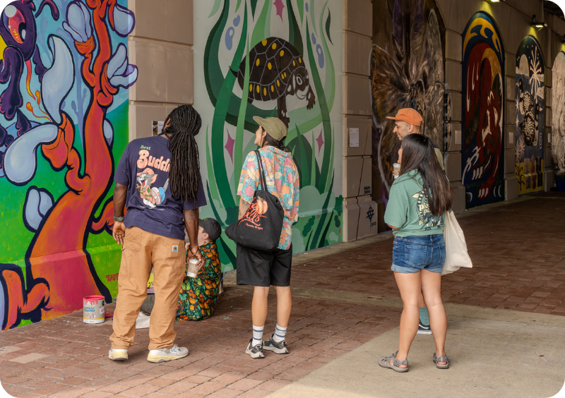 Locals explore and admire the new murals
