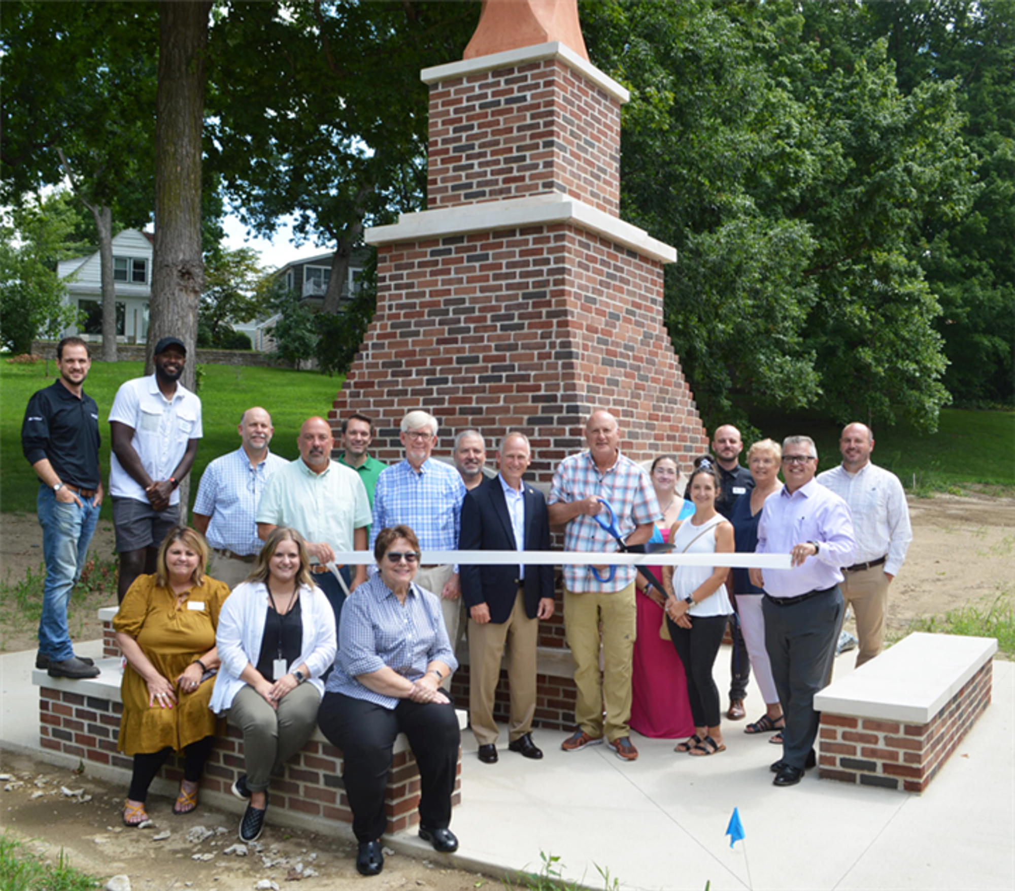 Miller Sunset Pavilion ribbon cutting ceremony around the new fireplace.
