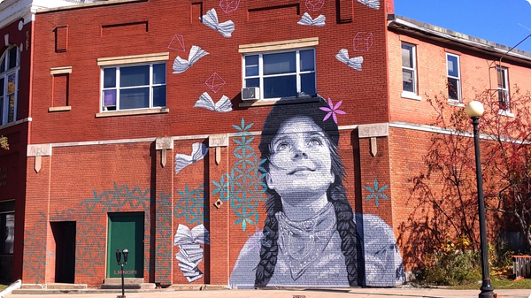 A mural of a woman in Vermont.