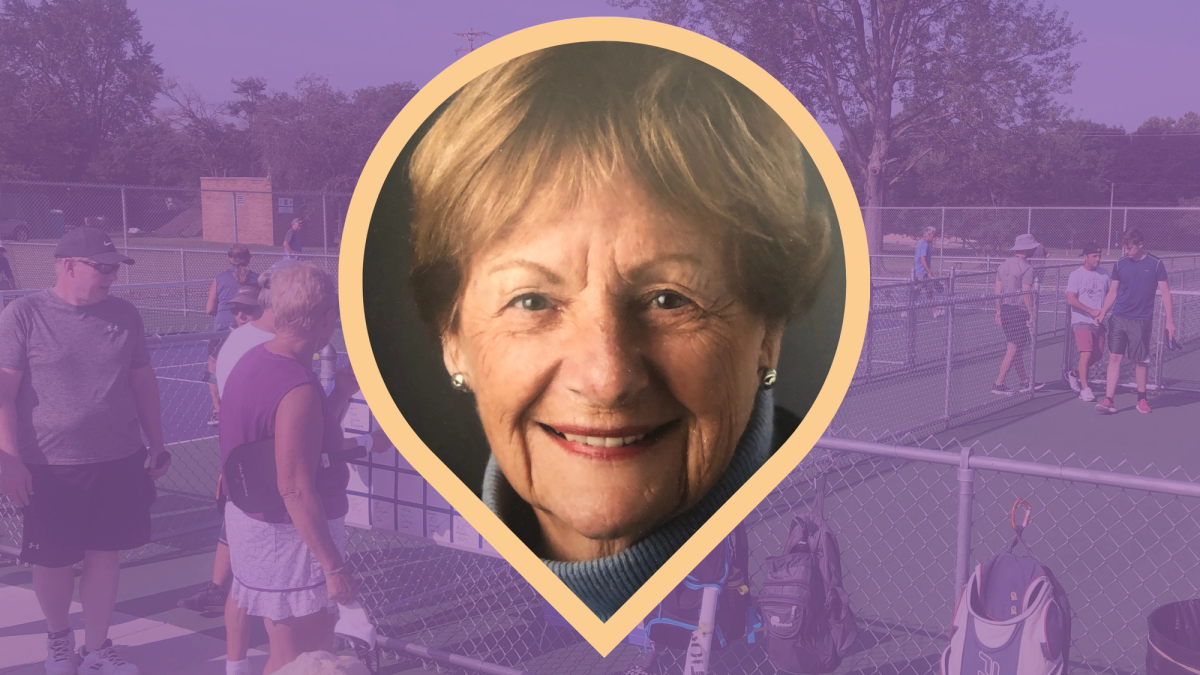 A headshot of Sue Mills against the backdrop of the Patriarche Park pickleball courts.