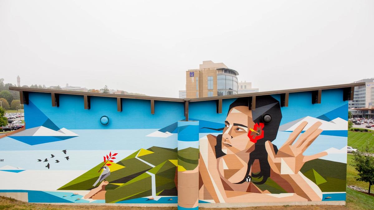 A geometric-style mural of a woman.