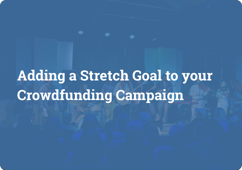 Text: Adding a Stretch Goal to your Crowdfunding Campaign, over image of a concert behind a transparent blue background.