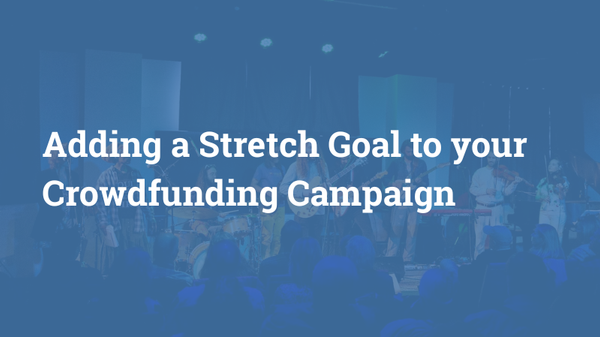 Text: Adding a Stretch Goal to your Crowdfunding Campaign, over image of a concert behind a transparent blue background.