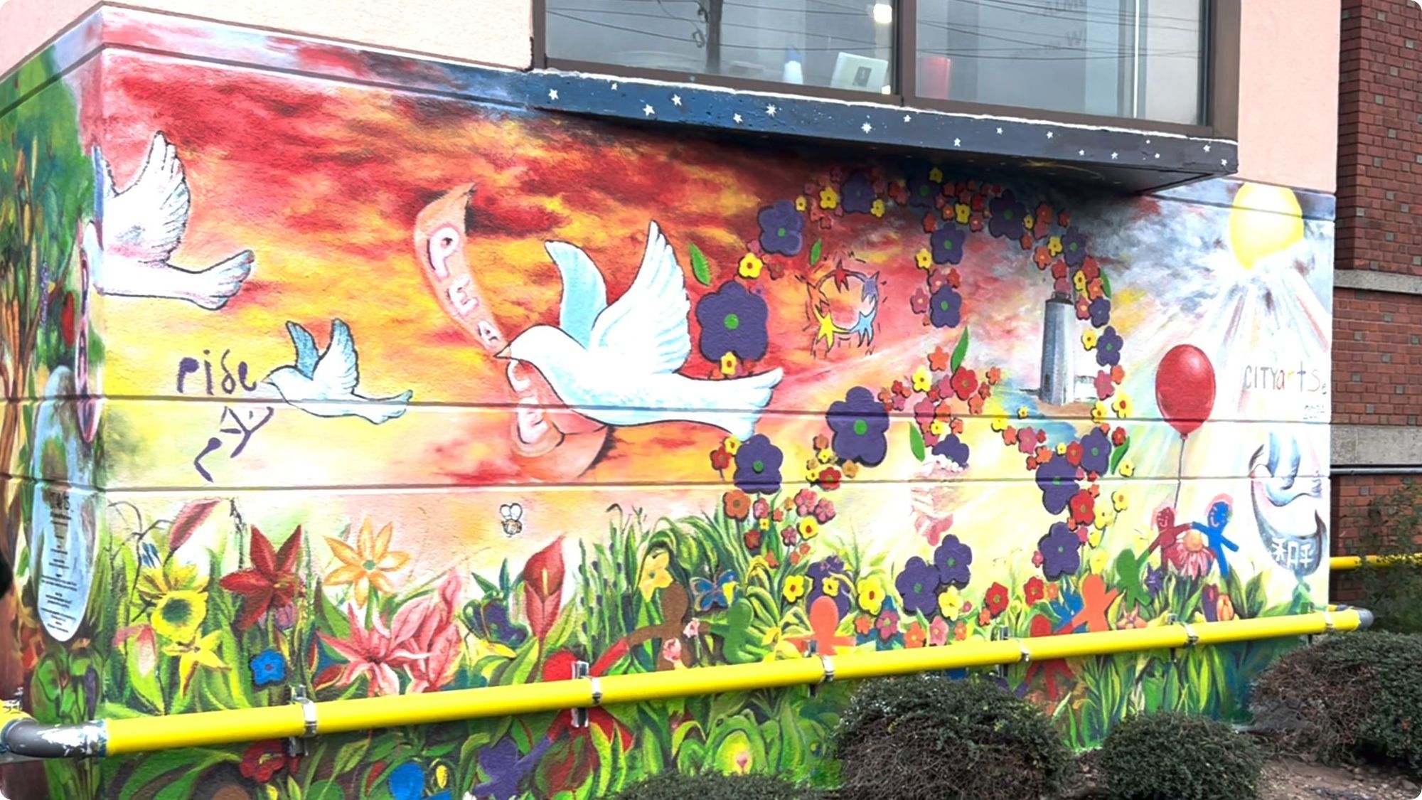 A colorful peace mural.