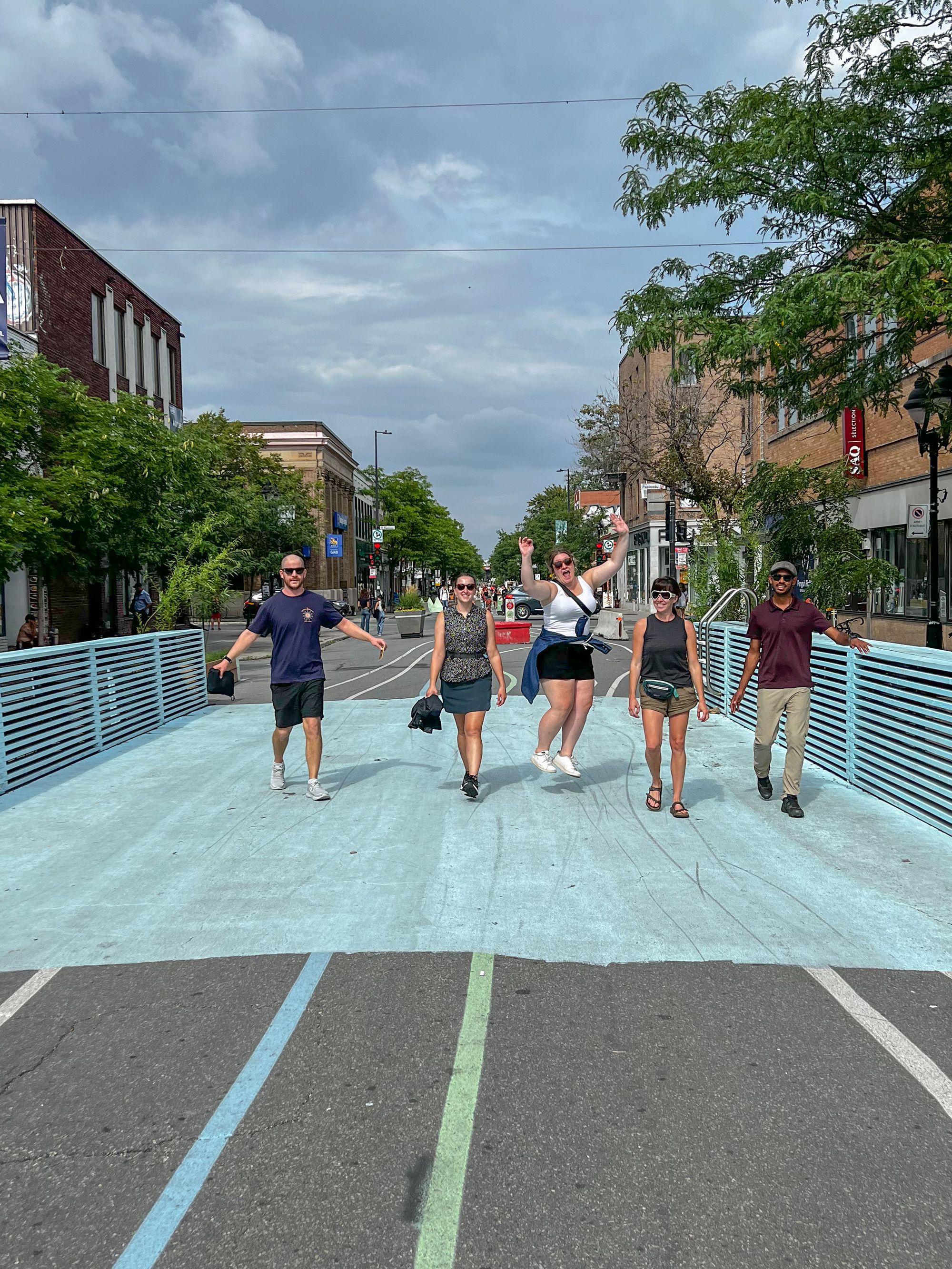 The Patronicity team walks through the cooling station along Mont-Royal Avenue designed to look like a pool.