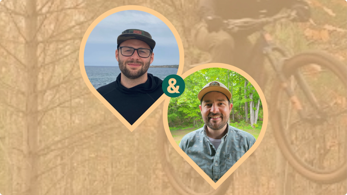 Headshots of two men within pinshape frames, with a mountain bike soaring in the background.