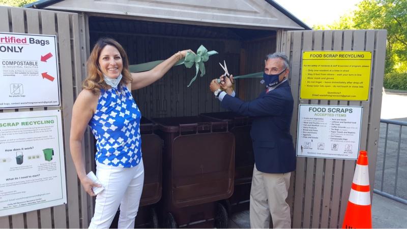 A ribbon cutting for a food scrap recycling center.