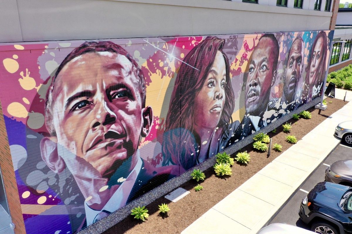 Bloomfield Racial Equity Mural by artist ARCY featuring images of leaders in Black history, including Obama and MLK.