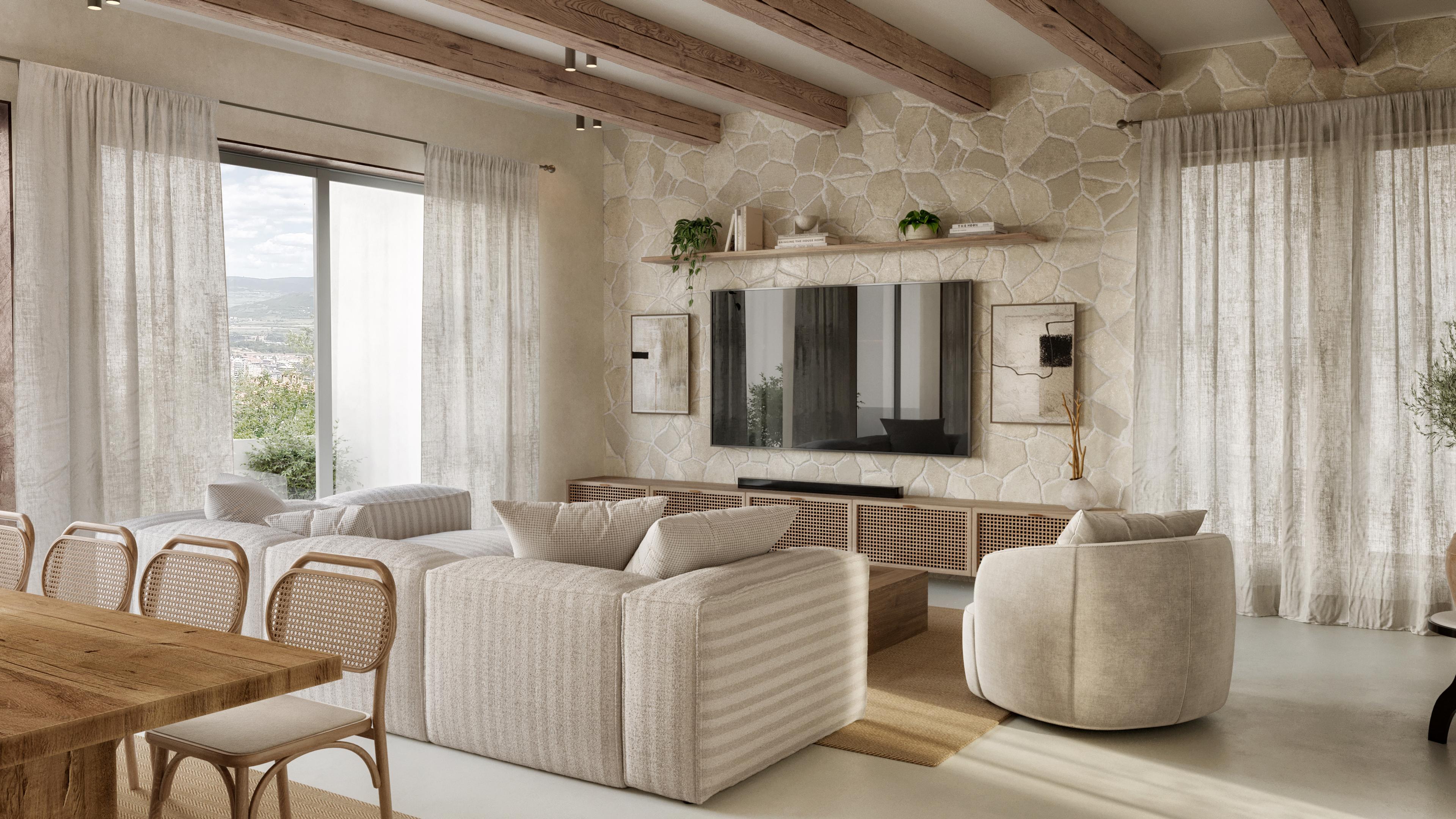 Living room with a stone feature wall, a TV unit and a long wooden dining table