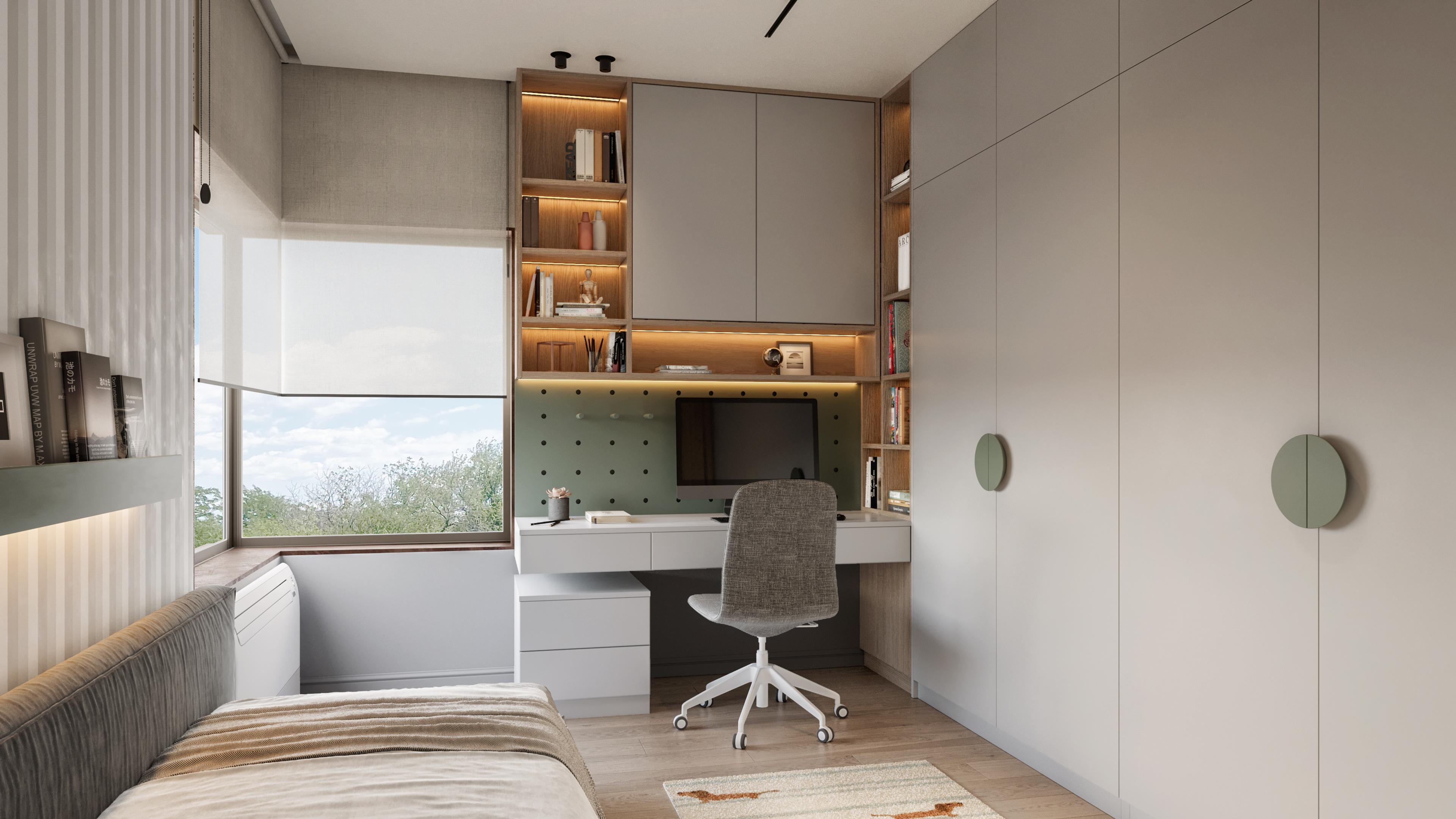 Child's bedroom with a built-in study desk, shelving and a green accent wardrobe