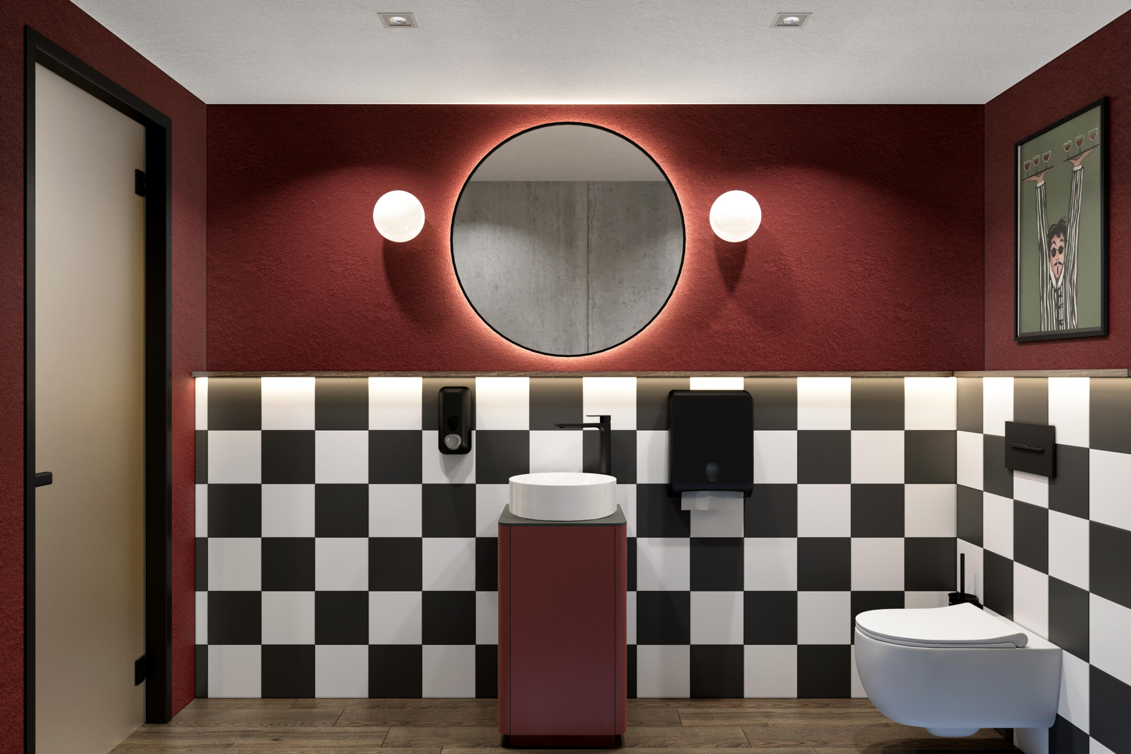 Restroom with burgundy walls, a round mirror and black and white chequered tiles