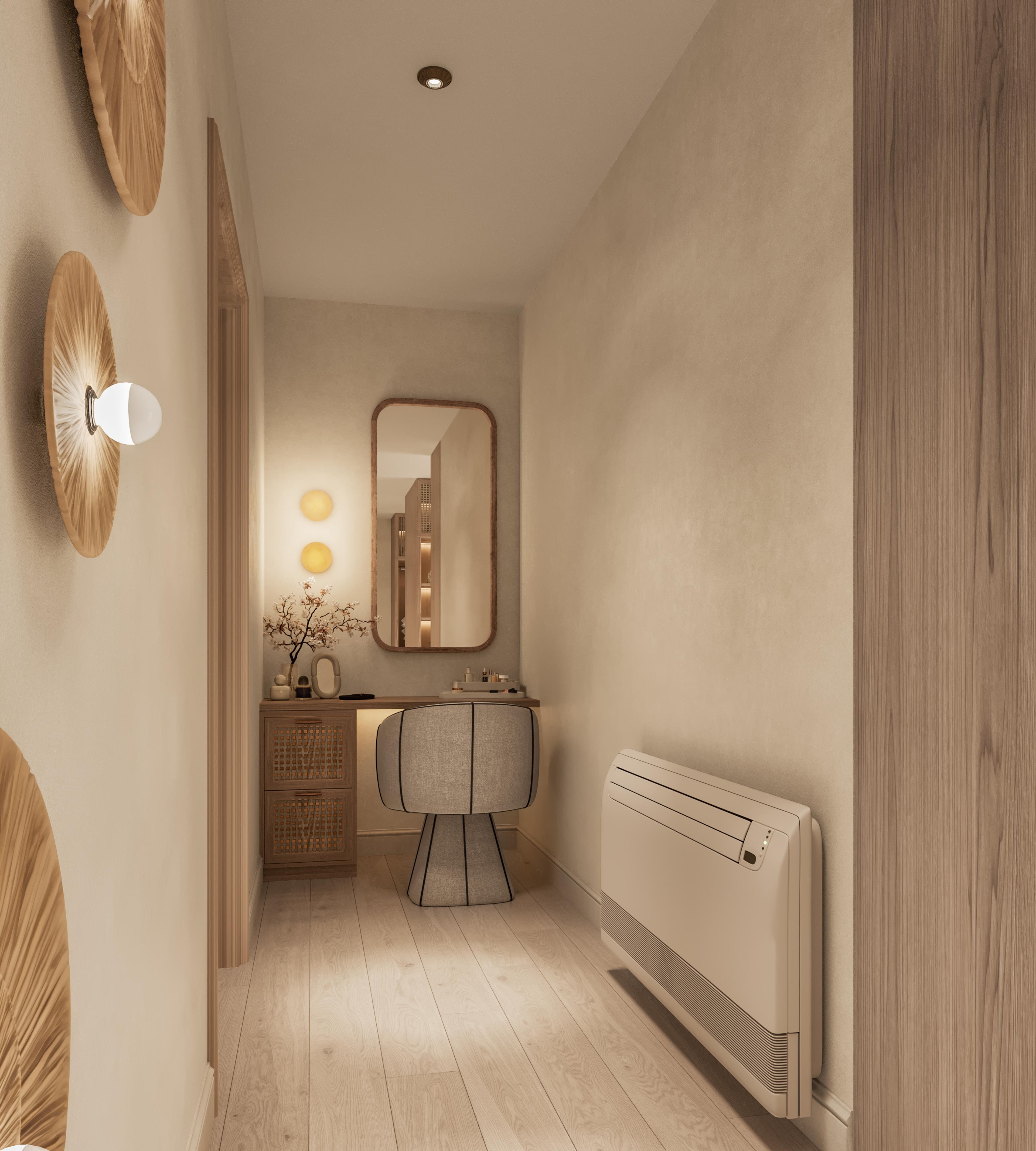 Dressing area with a vanity, a rounded mirror and woven wall lights