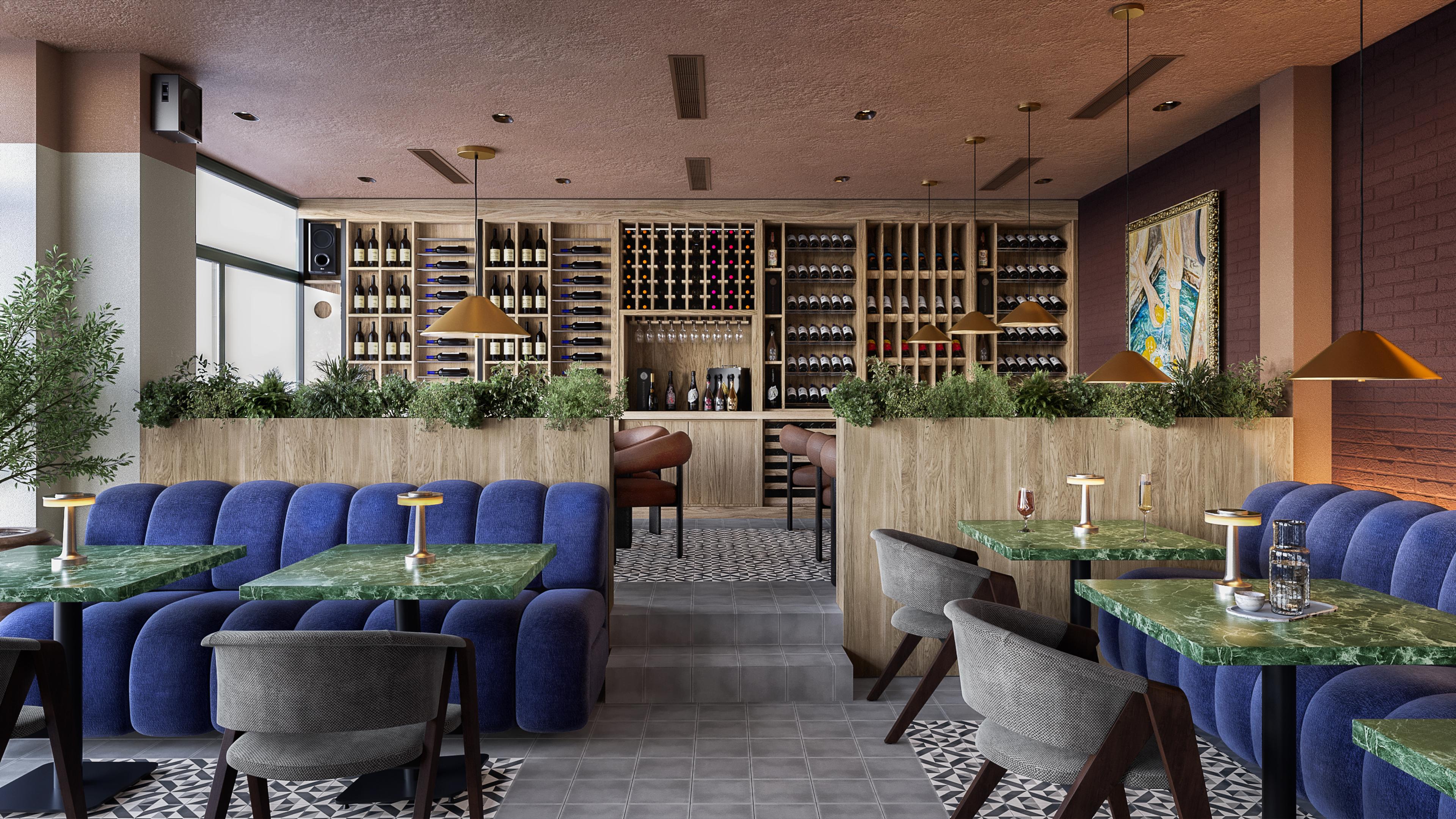 Dining room with blue velvet banquettes, planters and a wine display wall at the back