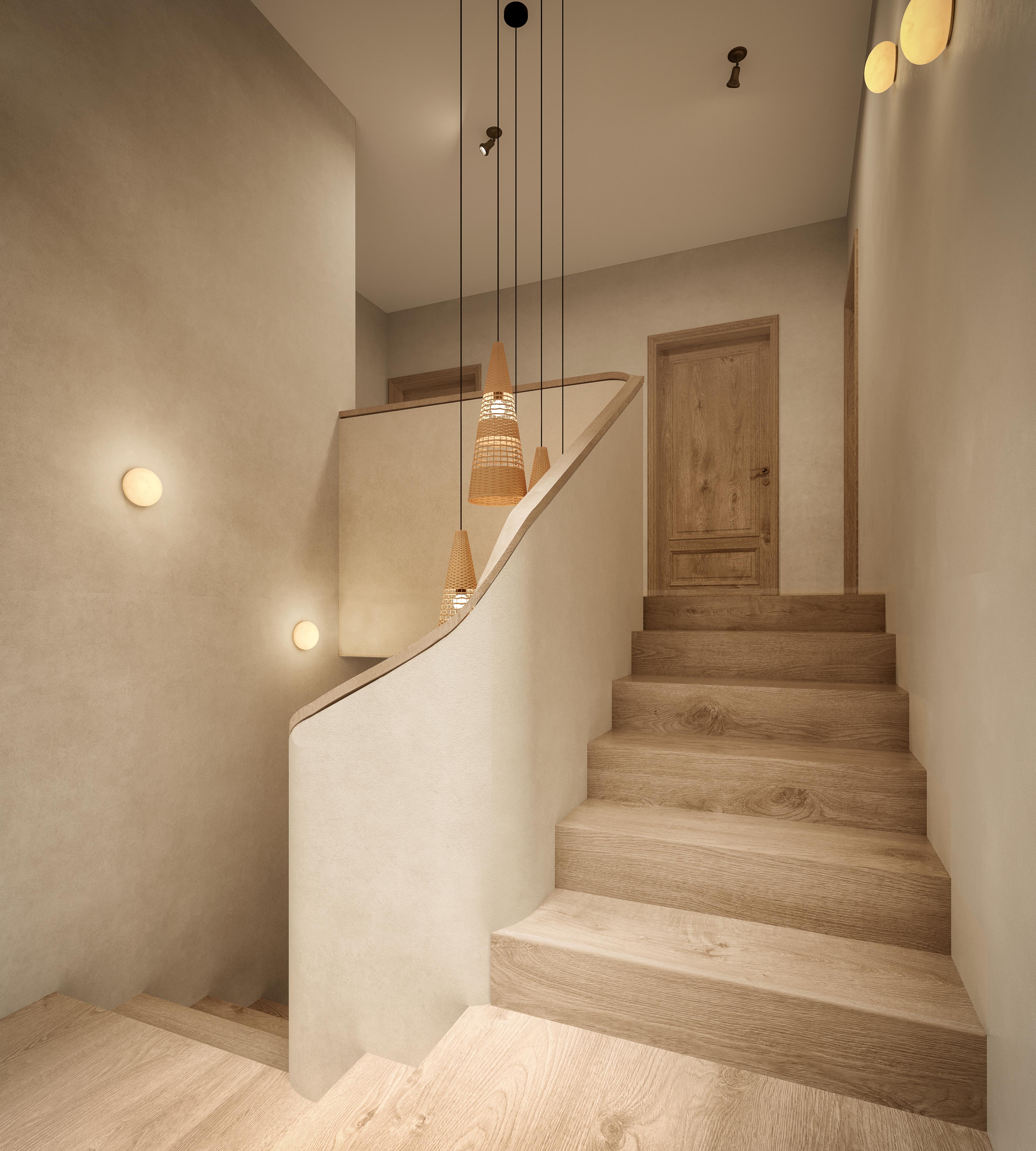 First-floor staircase with a timber door at the top and hanging pendant lights