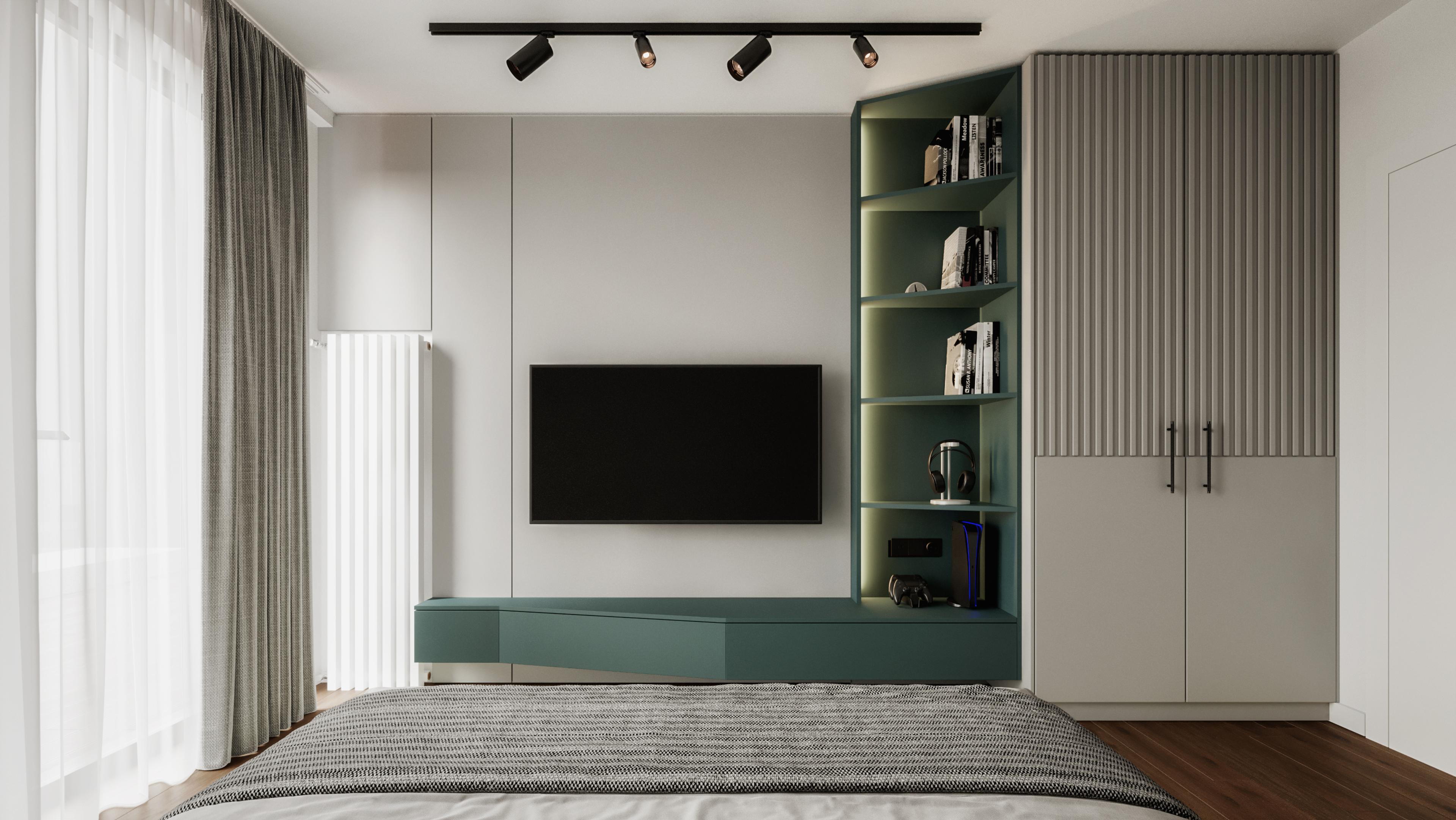 Bedroom wall unit with a TV, green shelves and ceiling track lights