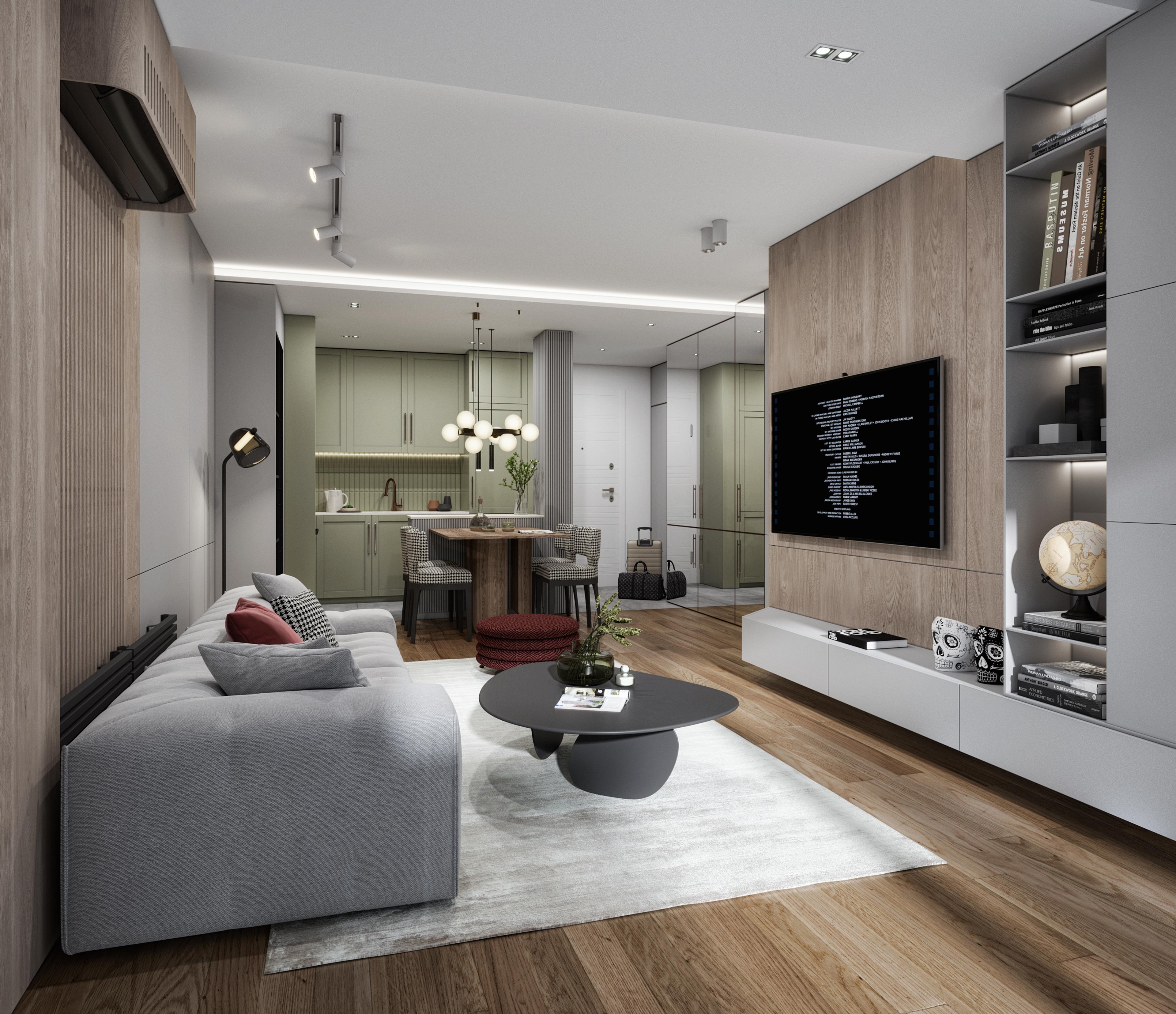 Living room with a grey sofa, black oval coffee tables and a TV wall with open shelving