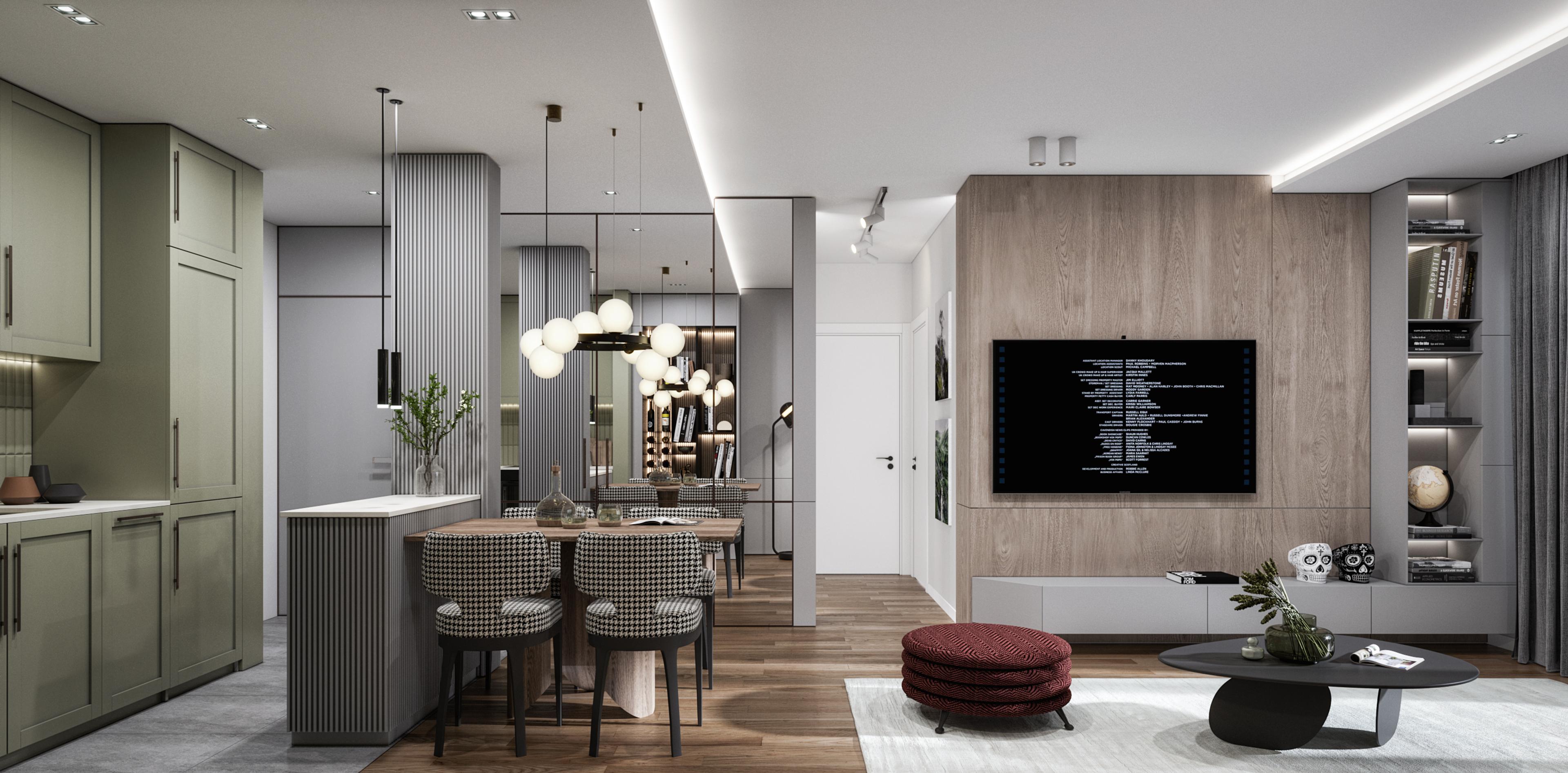 Living and dining area seen from the kitchen, with a wood-panelled TV wall and a grey sofa