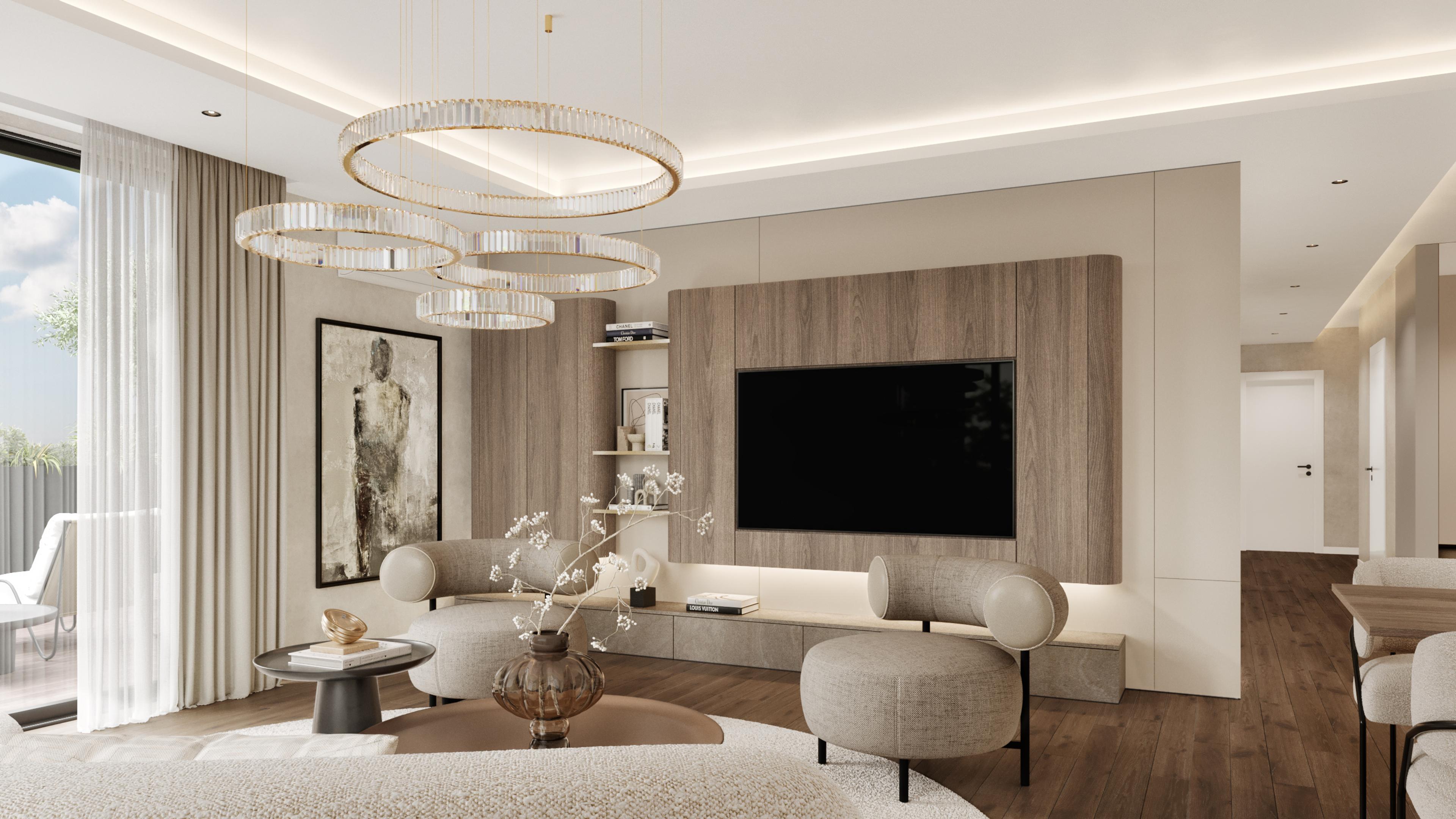 Living room with a wood-panelled TV wall, round chairs and crystal ring chandeliers