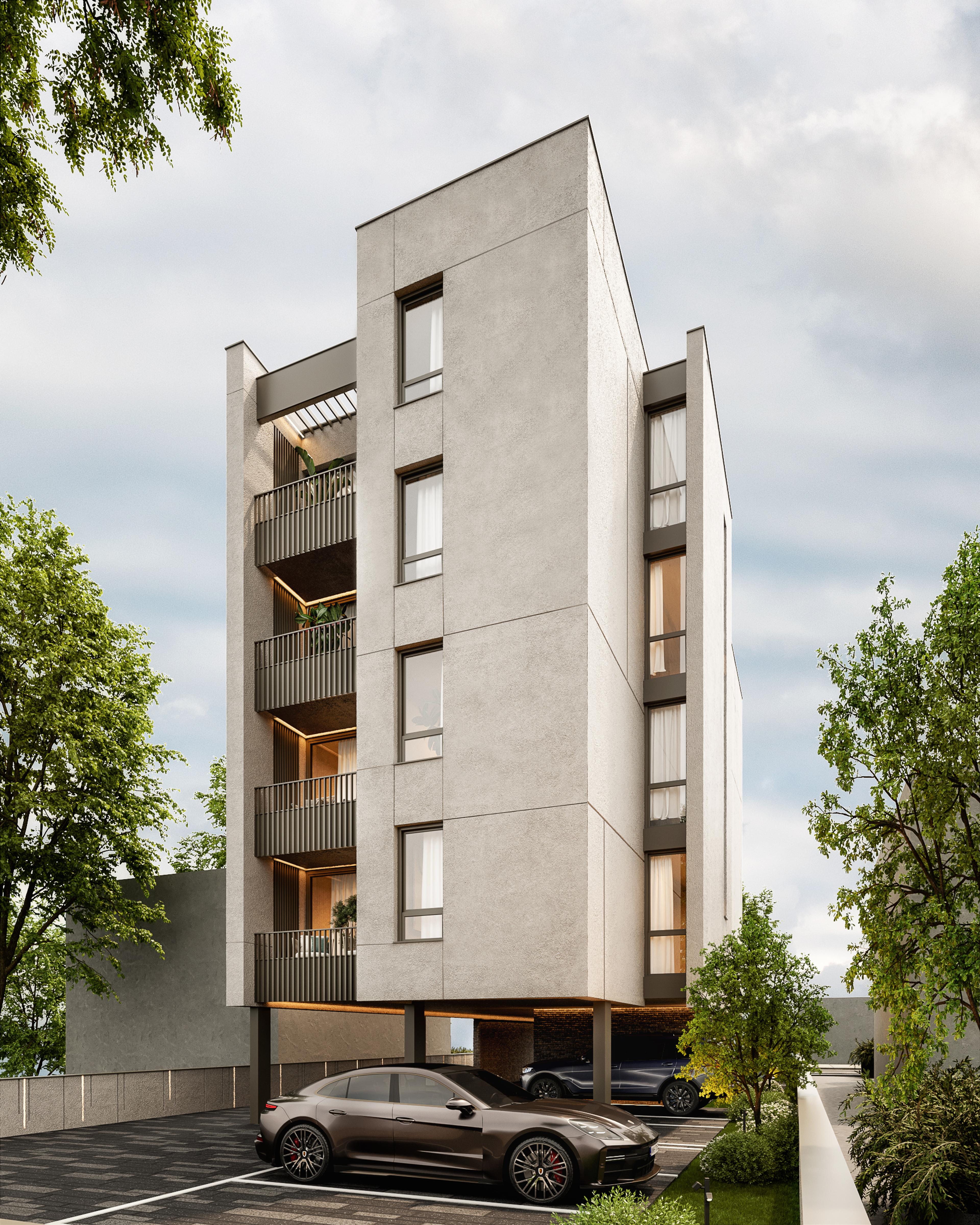 Angled view of the apartment building facade with stacked balconies and a car in the foreground
